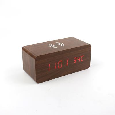 China Antique Style Wireless Phone Charging Time Temperature Table Wake Up Alarm Wooden Clock for sale