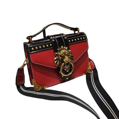 China High Quality Unique Mini Luxury Red Lion Head Ladies Shape Logo Inclined Shoulder Bag Custom Made for sale