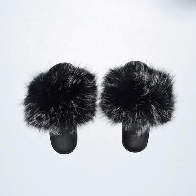 China 2021 Fashion Trend New Design Fur Slippers Trendy Women's Fur Slides Real Full Bulk Logo Fur Slides Custom Made for sale