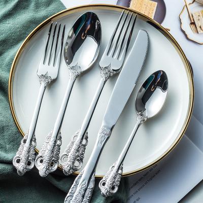 China Viable Factory Direct Shiny Silver Baroque Flatware Set Stainless Steel Vintage Cutlery Set With Fork Knife And Spoon for sale