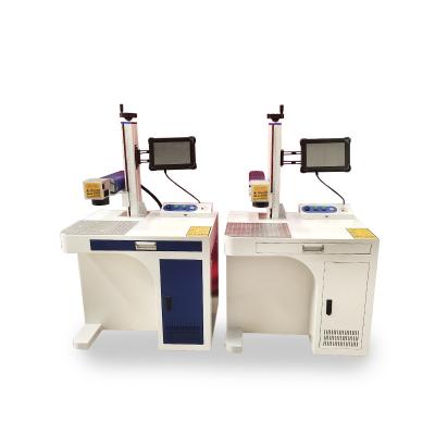 China 50W 100W Programmable Flight Marker Laser Marking Machines Printing Laser Machine For Packaging Printing Date for sale