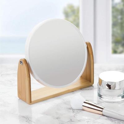 China Sustainable Modern Double Sided Bamboo Stand Free Standing Bathroom Vanity Makeup And Shaving Mirror for sale