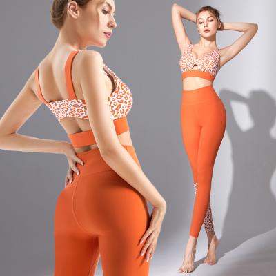 China Breathable Leopard Print Yoga Suit Female Europe And America Hip Lift High Waist Fashion Running Sports Fitness Two-piece Suit for sale