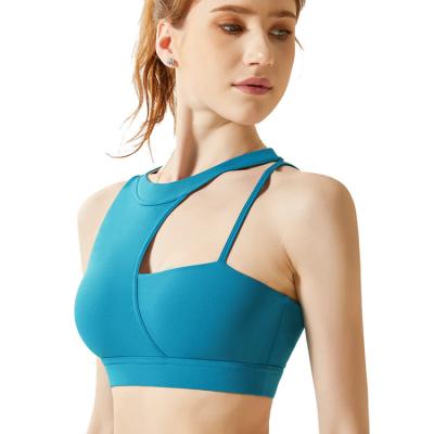 China Anti-Bacterial Women's Irregular Shoulder Strap Padded Sports Bra Shockproof Beautiful Back Yoga Wireless Supportive Sports Bra for sale