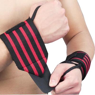 China Hook and loop fastener stripe to ensure proper grip on Wrist Power Weightlifting Wrist Support Wraps Gym Bandage Wrist Straps for sale