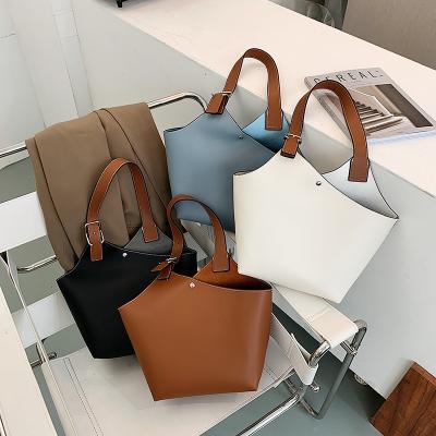 China Fashion Statistical Design Solid Color PU Shoulder Bag Fashion Simplicity High Capacity Leather Women Tote Bag for sale