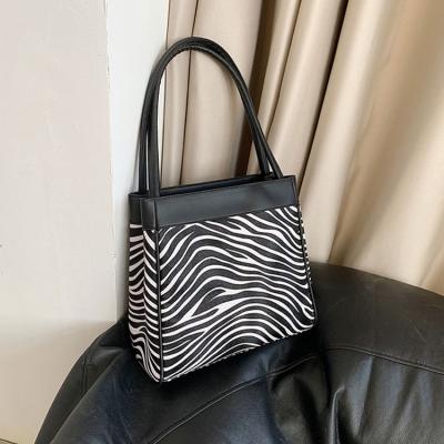 China Fashion Winter New Ins Fashion Zebra Pattern Bags Leopard Women Shoulder Bucket Tote High Capacity Handbag Bag for sale