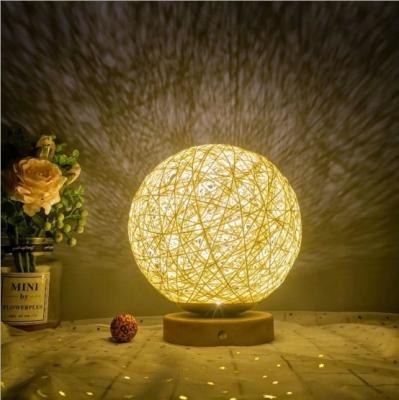 China Modern rural colorful decorative style bedside lamp 18CM sepa takraw table lamp rattan night light for sale