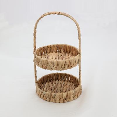 China Sustainable Double Layer Basket Tray With Handle Round Woven Water Hyacinth Storage Basket for sale