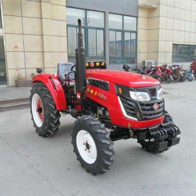 China Farm Work Machinery Multifunctional agricultural four wheel drive agricultural tractor Compact tractor Small 4x4 mini agricultural tractor for sale