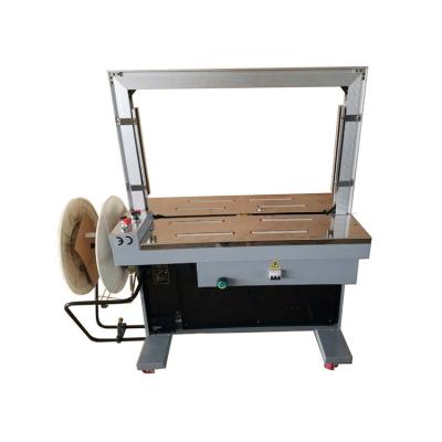 China Best Selling PP Steel Belt Strap Extrusion Of CLOTHING Making Pneumatic Strapping Machine for sale