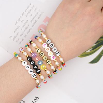 China Wholesale cute coloful seed beads charm letter bracelet love charm Boho bead stretch bead bracelet for sale