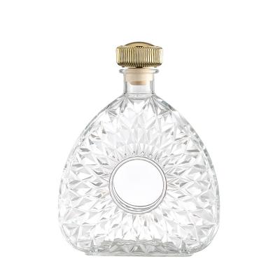 China 750ml High Quality Eco-friendly Recyclable 700ml Carving Design Whiskey Decanter Glass Wine Bottle for sale