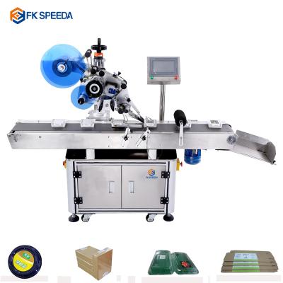 China FK-SPEEDA Mylar Food Bag Labeling Machine Flat Surface Pocket Applicator with Paging Machine for sale