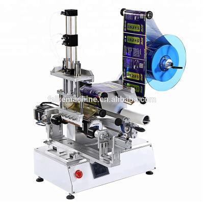 China CLOTHING FK616 Manual Desktop Square Bottle Labeling Machine Rotary Label Applicator for Tapered Bottles Plastic Bottle Labeler for Sale for sale