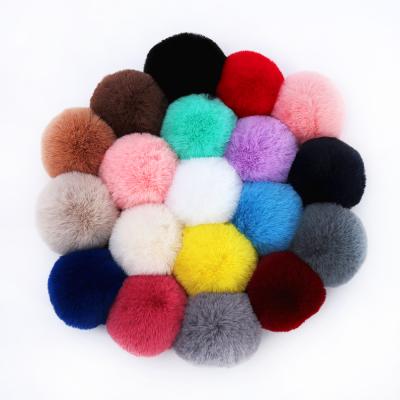 China Super Soft Bulk Faux Plush Rabbit Fur Pom Poms In Animal Fur For Winter Hats 8CM Fur Pom Pom Deck for sale