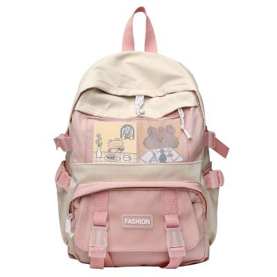 China 2021 new schoolbag high school backpack fashion large capacity high capacity female junior high school students and primary school students for sale