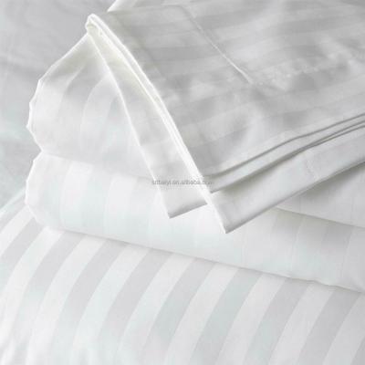 China Microfiber Shrink-Resistant Bed Sheet Embossed Stripe Fabric Wholesale Solid Plain Dyed Woven Brushed Polyester Fabric for sale