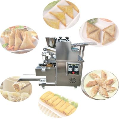 China Can make many styles of commercial automatic food samosa spring roll dumpling empanada maker food making machine dumpling skin machine for sale