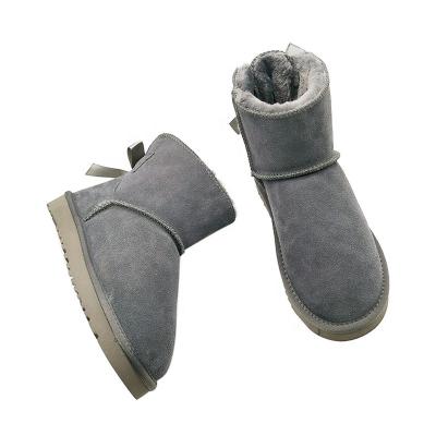 China Lightweight upper selling genuine fur cowhide real wool snow boots winter leather lady and children warm casual boots for sale