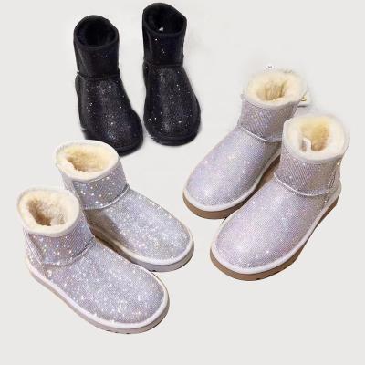 China New women's snow sheepskin short boots light wool integrated warm boots and full diamond flash diamond women's boots super waterproof for sale