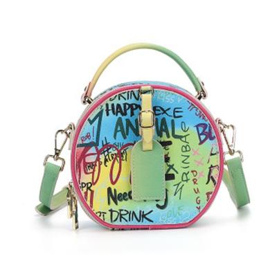 China Wholesale Fashion China New Circle Shape Handbags Women Fashion Colorful Printed Graffiti Printed Purses for sale