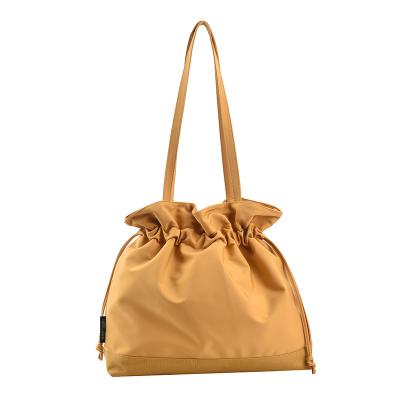 China Cheap Promotional Empty Sling Bag Waterproof Canvas Shoulder Bag Single Drawstring Tote Bag for sale