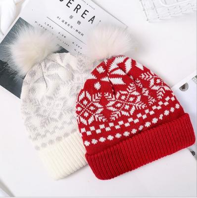 China JOINT Christmas Snowflake Elks Winter Knit Hat Women Fashion Ball Yarn Woolen Hat for sale