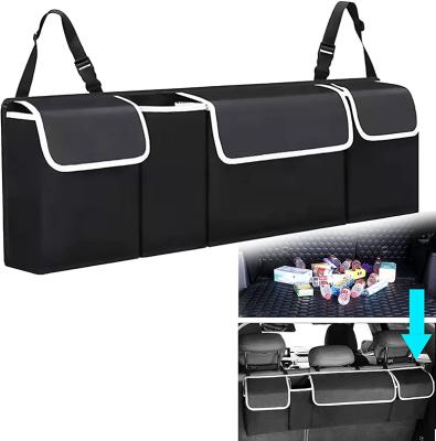 China For Kids Backseat Car Trunk Organizer 600D Large Car Storage Organizer Geometric Foldable Backseat Tidy Organizer Hanging Storage Bag for sale