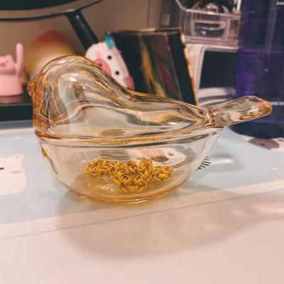 China Morden Luxury New Arrival Exquisite Jewelry Rings Necklace Storage Glass Animal Shape Storage Candy Decorative Glass Jar With Bird Lid for sale