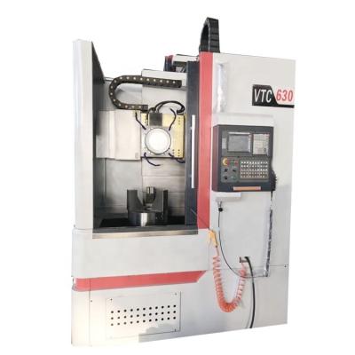 China Multi Purpose Metal Working CNC Vertical Lathe VTC630 Automatic Turret Vertical Lathe For Wheel Disc Processing for sale