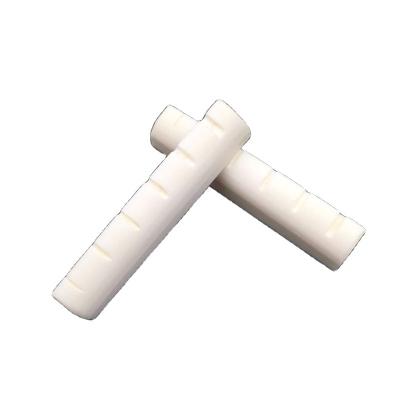 China Eco-friendly Real Family Slotted Guitar Bone Nut For Folk Acoustic Guitar Parts Guitar Tool Rest for sale