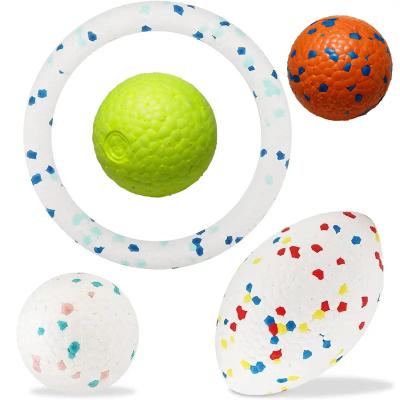 China Olive Ball Pet Dog Interactive Chew Resistant Foam Viable Football Bite Unbreakable Toy for sale