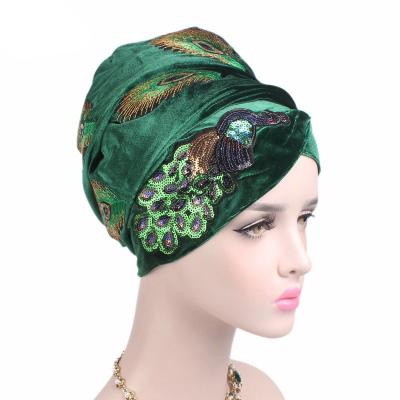 China New Peacock Dobby Sequin Scarf Hat African Long Tail Scarf Hat Head Wraps Hijab Hats for sale