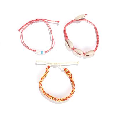 China New Style Wax Yarn Waterproof Rice Religious Bohemian Bead Braided Five-Piece Bracelet Maker for sale