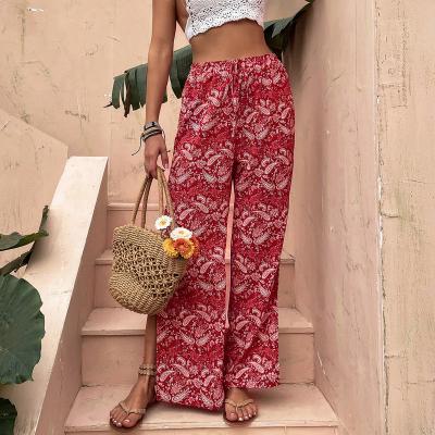 China Fashion anti-static side slit pants hippie pants women's printed loose waist summer bohemian wide casual loose elastic leg for sale