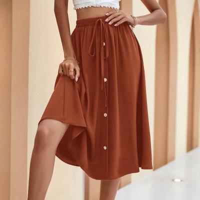 China Antistatic the stylish 2022 skirt is a hit with orange buttons and a high-waisted bow for sale