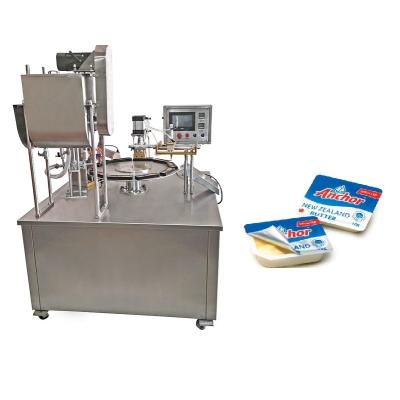 China Food China Supplier Rotary Cup Filling Sealing Machine for Oil, Honey, Cream, Jelly, Jam for sale