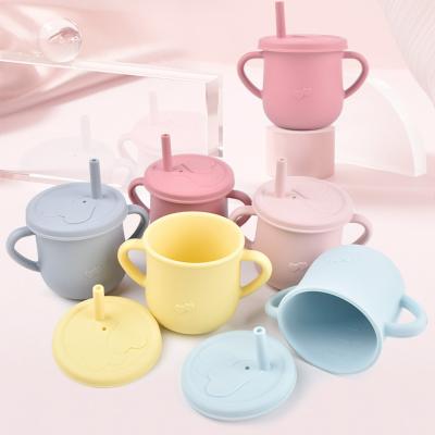 China Modern Dishwasher Safe Portable Unbreakable Kids Toddler Baby Training Silicone Water Drinking Sippy Cup with Straw and Handle for sale