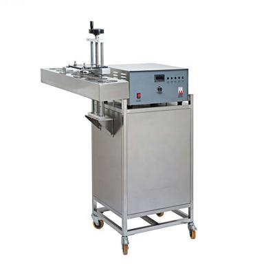 China High Quality Guangzhou TZ New Food Electro Magnetic Induction Aluminum Foil Sealing Machine For Bottles for sale