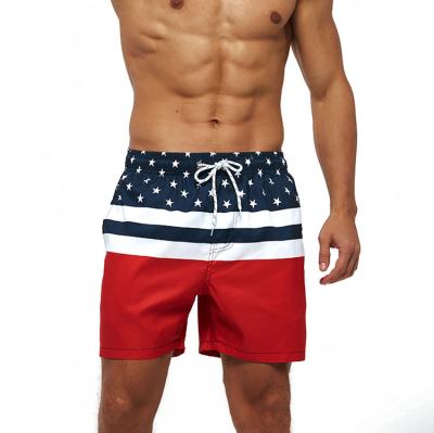 China New Anti-wrinkle Men's Printed Casual Shorts Summer Beach Pants Mens Floral Loose Swimming Beach Shorts for sale