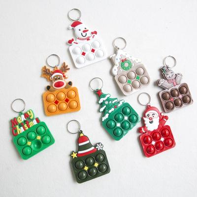 China Christmas Decoration Maker Silicone Autism Busy Person Key Chain PVC Mini Sensory Noise Toy Small Key Chain for sale