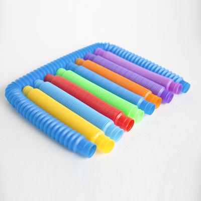 China 2021 Hot Selling Amazon Wholesale Educational Toy Funny DIY Colorful Building Plastic Wiggle Sensory Tools Pop Up Tubes Whistle Sensory Toys For Kids Stretch for sale