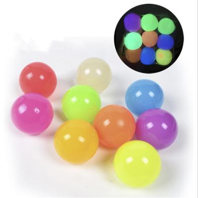 China Stress Relax 6.5cm Bulk Sale TPR Indicative Ceiling Warm Glow In Dark Sticky Wall Balls For Kids for sale