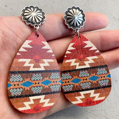 China Environmentally friendly European and American Aztec wood fashion exaggerated earrings metal retro jewelry earrings for sale