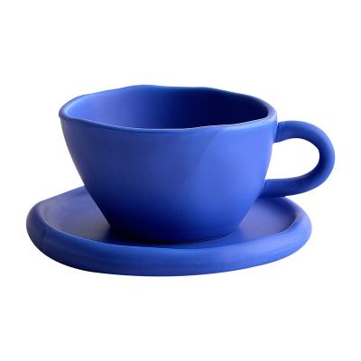 China Viable Creative Irregular Blue Hand Pinch Ins Klein Ceramic Mug With Saucer Milk Breakfast Ceramic Cup for sale