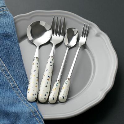 China Sustainable Ceramic Stainless Steel Handle Cutlery With Porcelain Handle for sale