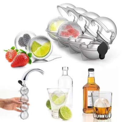 China Sustainable Four-hole Cooler Whiskey Round Ice Hockey Mold Tray Mold Ice Hockey Mold for sale