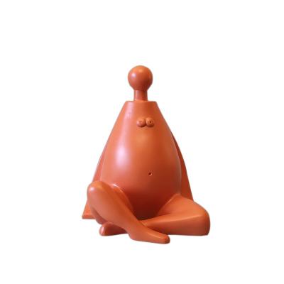 China Contemporary Modern minimalist abstract character orange art decoration Living room desktop decoration Children's room soft decoration for sale