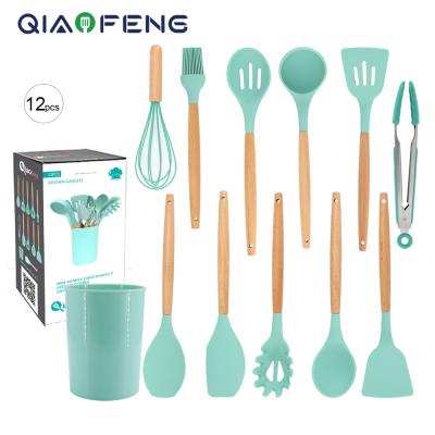 China Sustainable High Quality Household Kitchen Accessories 12pcs Silicone Utensils Set With Beech Wood Handle for sale